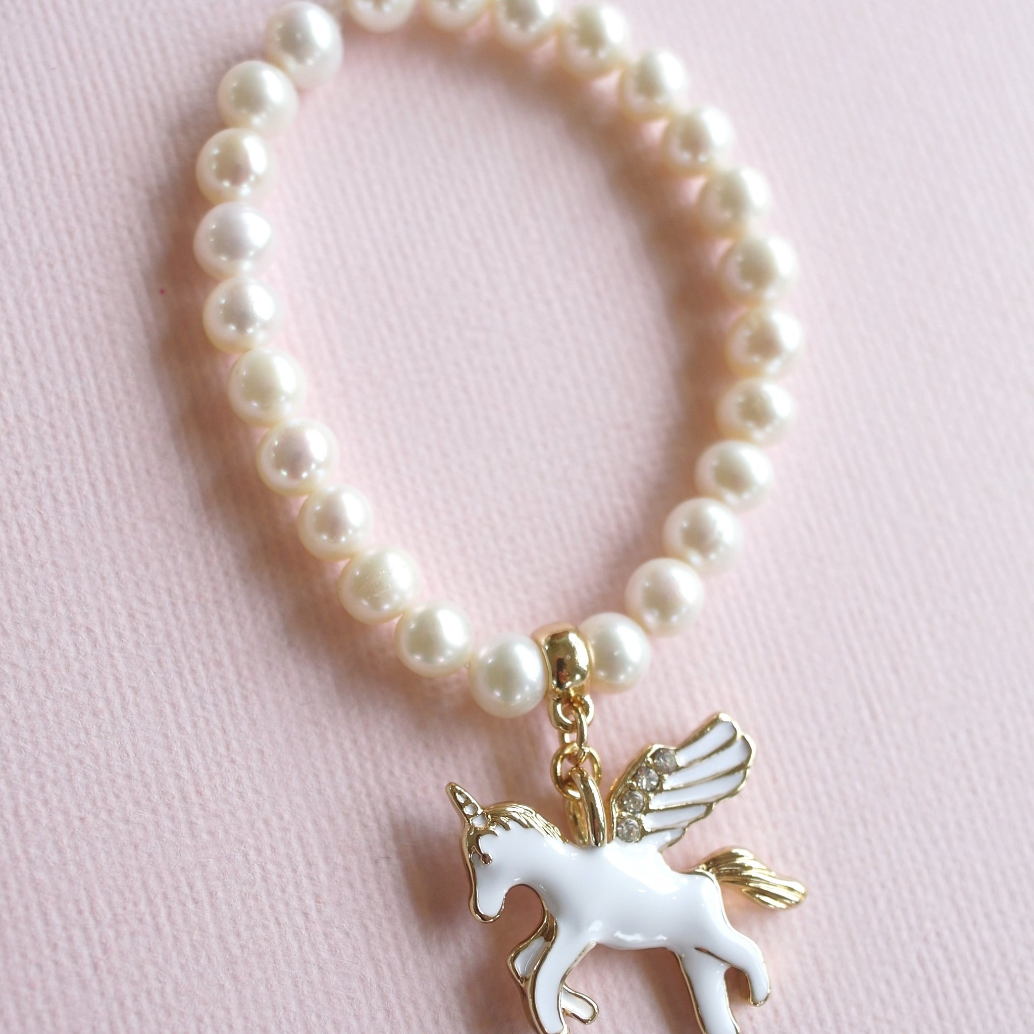 Unicorn necklace with pearl top